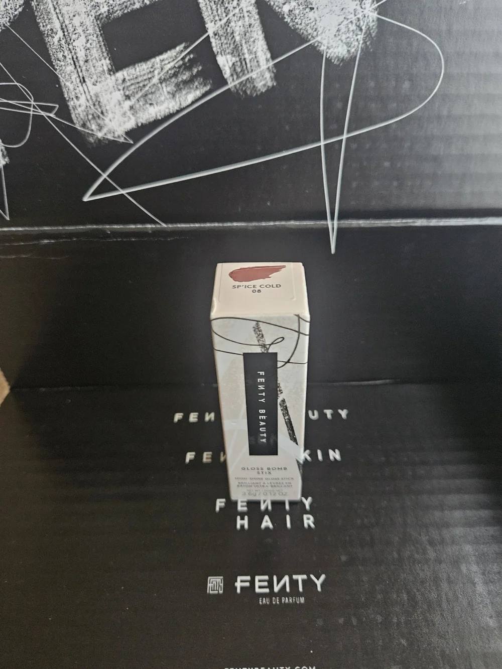 Fenty Beauty Gloss Bomb Lip Stix High Shine Gloss Stick— Sp'ice Cold
